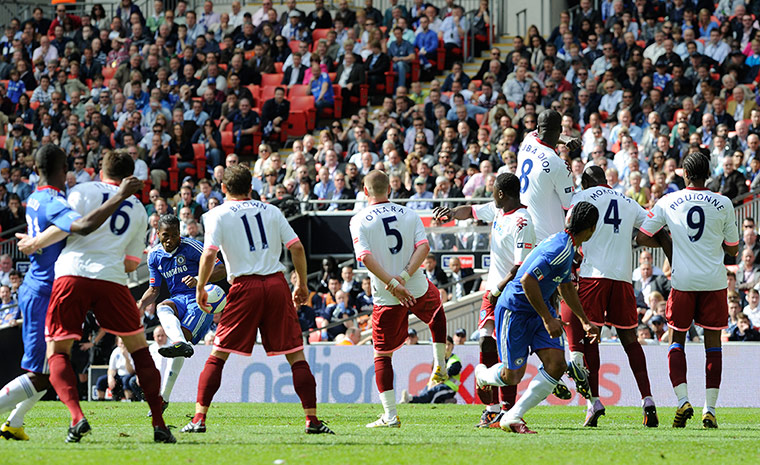 top 10 drogba goals: Chelsea's Didier Drogba scores against Portsmouth in the 2010 FA Cup Final
