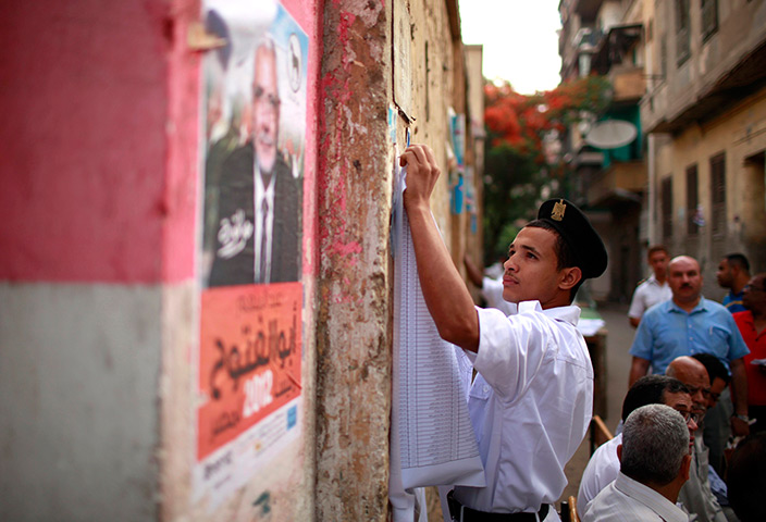 Egypt elections: An Egyptian policeman outside a polling station in Cairo