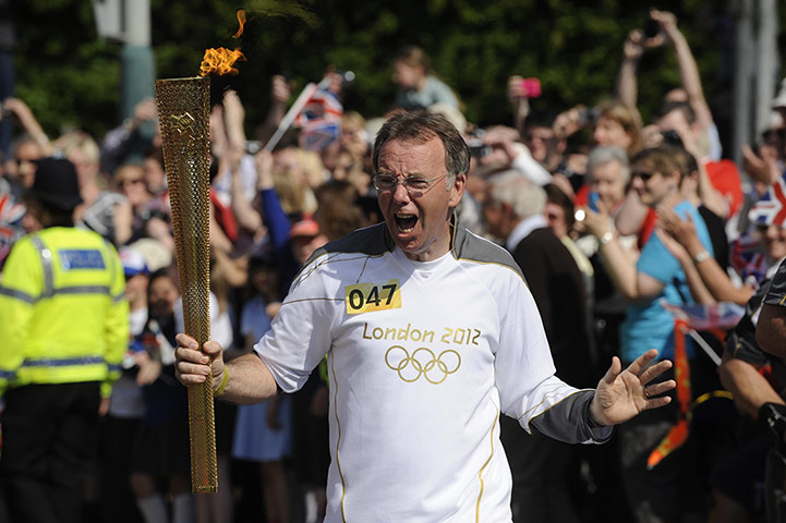 Picture desk live: William Cruickshank carries the Olympic torch between Chippenham and Calne