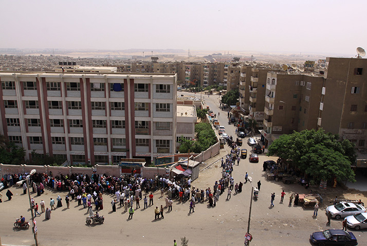 Egypt election: Egyptians line up to vote in the presidential election 