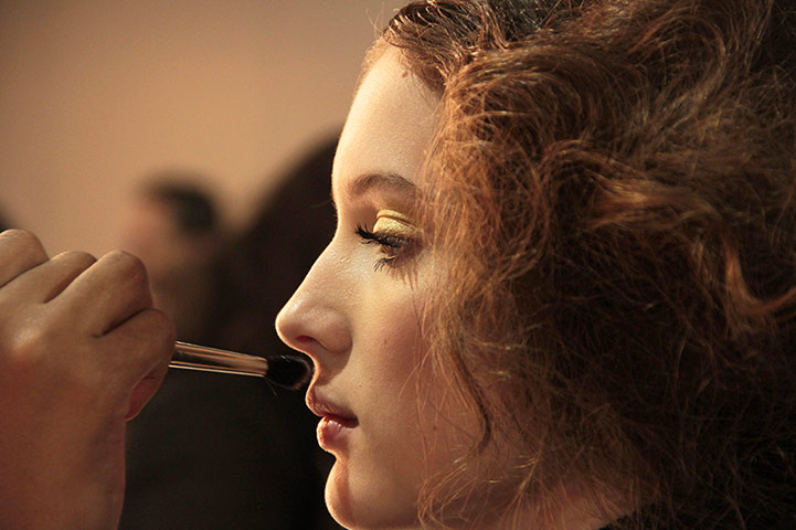 Picture desk live: A model is seen backstage at the Fashion Rio Summer 2012-2013 in Brazil