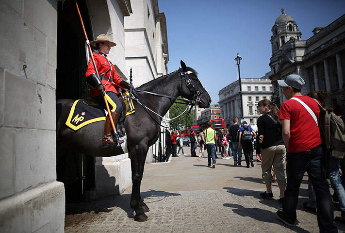 Picture desk live: Canadian Mounted Police on ceremonial duties in London
