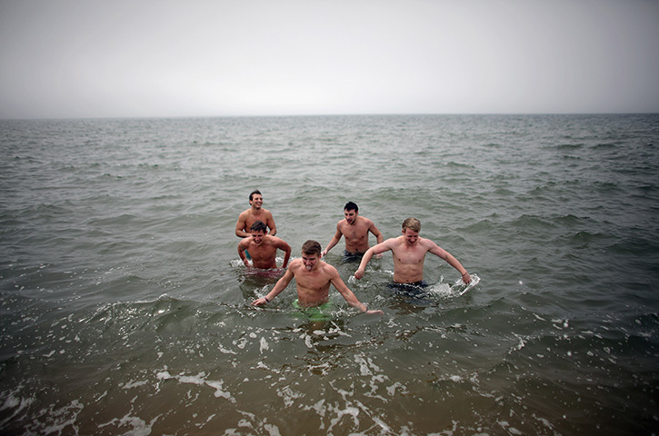 UK heatwave: Students brave the chilly North Sea in Blackpool