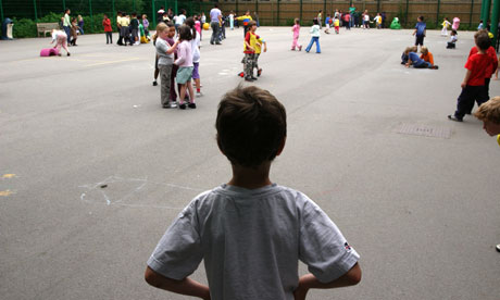 A child alone in a school playground