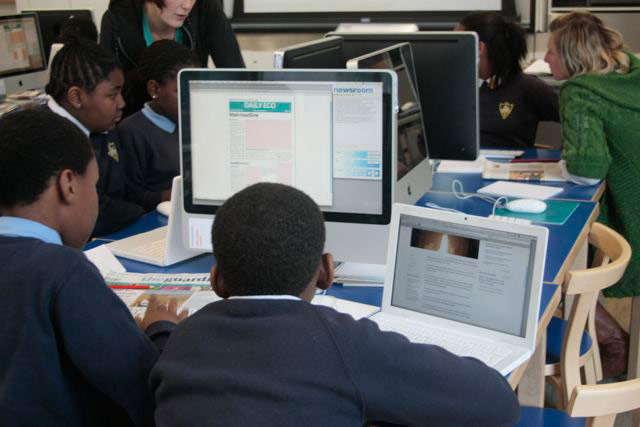 Education Centre visit: Education Centre - researching stories on laptop