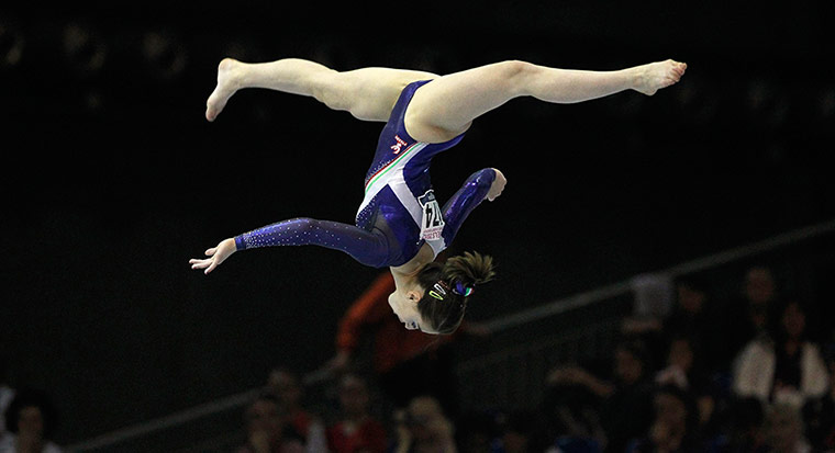 Longer View: Carlotta Ferlito of Italy performs on the beam