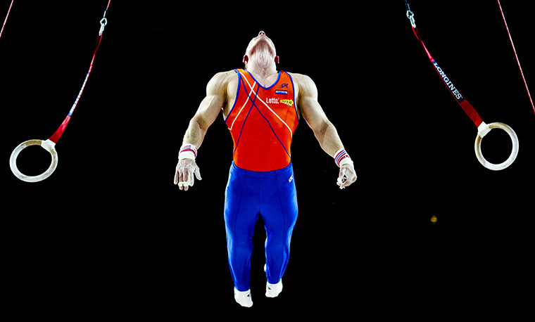 Longer View: Yuri van Gelder of the Netherlands competes on the rings 