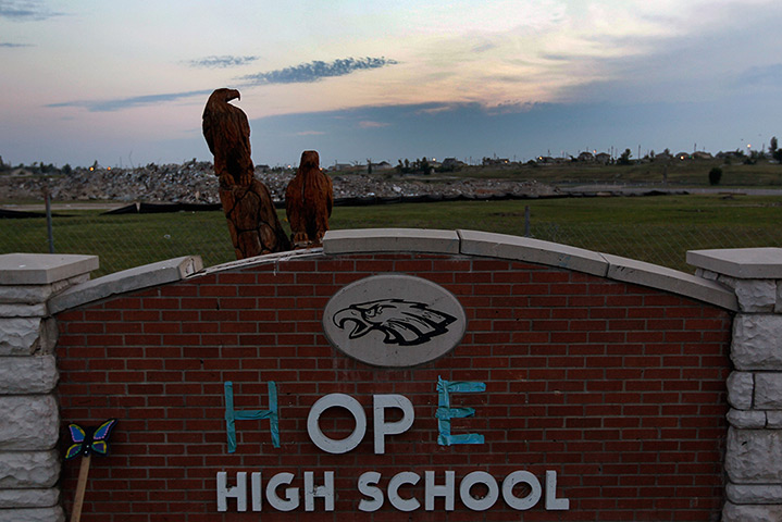 FTA: Joe Raedle: The Joplin High School sign in front of the rubble of the school 