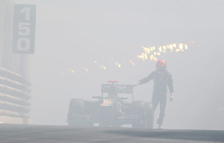 sport: Smoke comes out from Caterham Formula One car