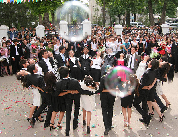 Picture Desk Live: Tajik secondary school students celebrate graduation