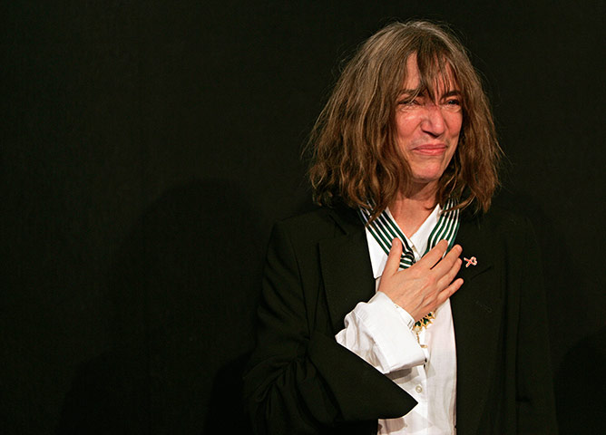 Patti Smith: Patti Smith reacts after being decorated by French Culture Minister