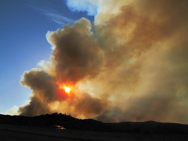Wildfires: A fire blazes in Arizona's Tonto National Forest