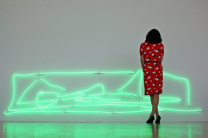 Tracey Emin exhibition: A visitor walks past an installation entitled 'Nothing Is Real'