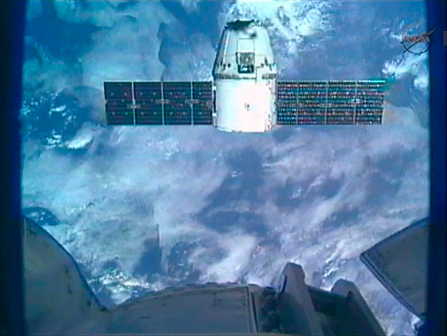 SpaceX Dragon: The SpaceX Dragon commercial cargo  into position for docking with ISS 