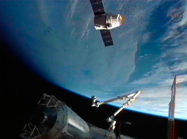 SpaceX Dragon: The SpaceX Dragon commercial cargo  into position for docking with ISS 