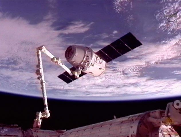 SpaceX Dragon: The SpaceX Dragon commercial cargo  into position for docking with ISS 