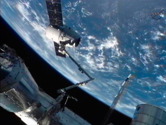 SpaceX Dragon: The SpaceX Dragon commercial cargo  into position for docking with ISS 