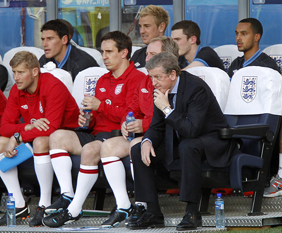 Norway v England: Roy Hodgson and Gary Neville look on during the first  half