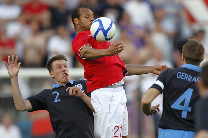 ingurlund v norway: Phil Jones goes up for the ball with Daniel Omoya Braaten 