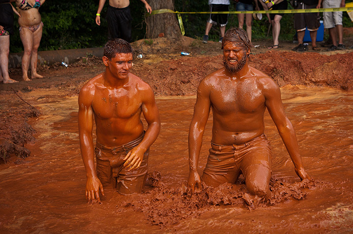 Redneck games: Competitors wade out of the mud pit