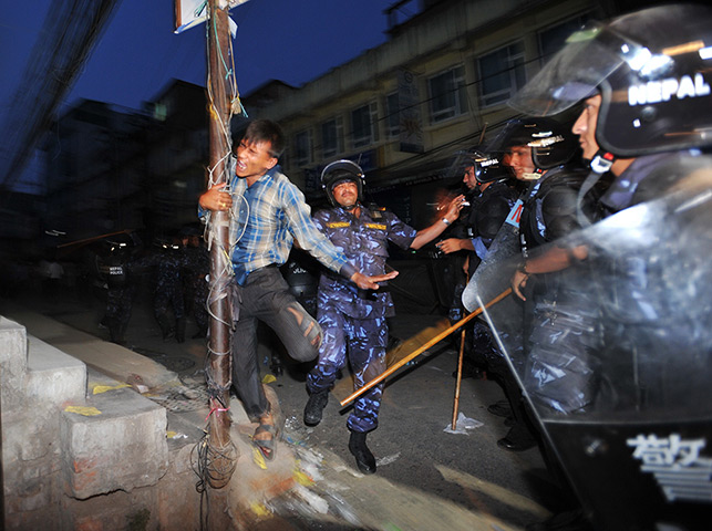24 hours: Kathmandu, Nepal: Riot police baton charge activists 