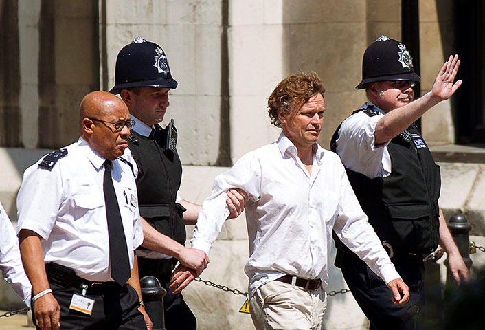Picture Desk Live: Protester at the Leveson Inquiry