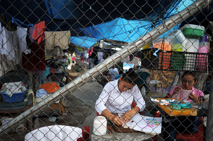 24 hours: San Salvador, El Salvador: Inmates draw inside the national female prision