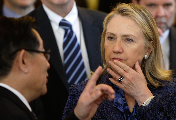Picture Desk Live: Hillary Clinton gestures at China's Minister of Science