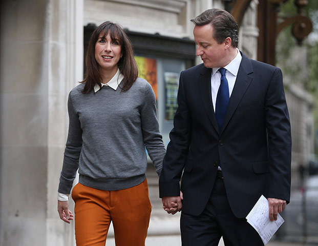 Picture Desk Live: Britain's Prime Minister David Cameron walks to a polling station