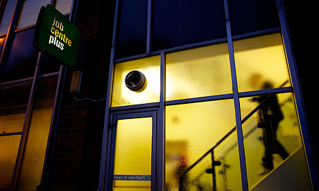 Man in job centre plus window