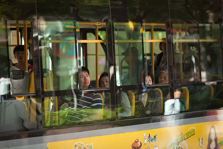 24 hours: Beijing, China: A passenger looks toward where Chen Guangcheng is staying