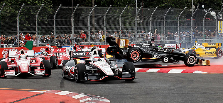 Best of the week: Will Power leads a pack of cars through a chicane