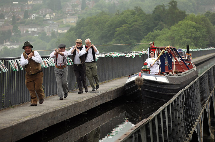 Picture Desk Live: The Olympic Flame Continues Its Journey Around The UK