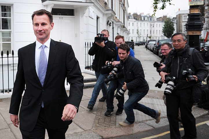 Picture desk live: British Culture Secretary Jeremy Hunt leaves home for the Leveson Inquiry