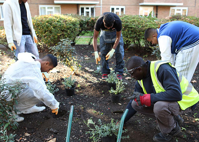 tower hamlets gallery: Young residents improve a shared garden