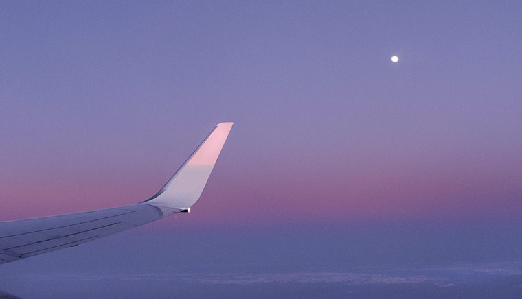 Your Pictures: Your Pictures: view out of an airplane window of purple sunset