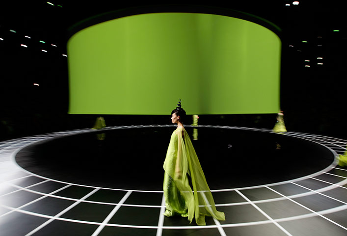 Picture Desk Live: A model presents a creation for the Giorgio Armani fashion show in Beijing