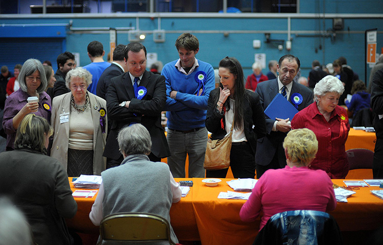 Local elections: Candidates watch as votes are counted at the Oasis Leisure Centre, Swindon