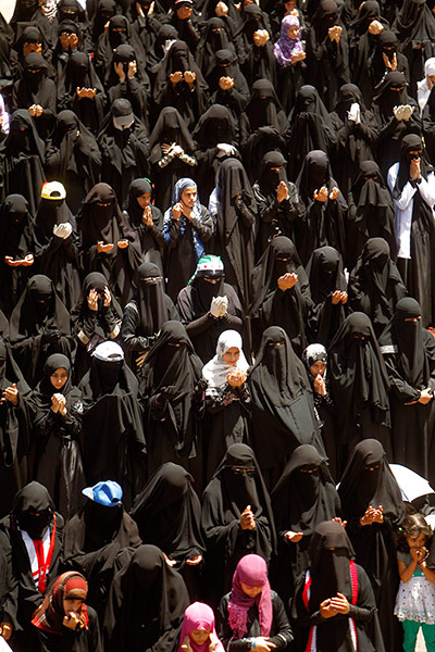 Picture Desk Live: Women recite prayers during an anti-government rally in Sanaa
