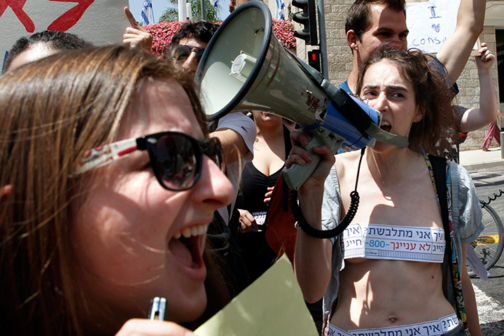 Picture Desk Live: Israeli activists chant slogans during a 