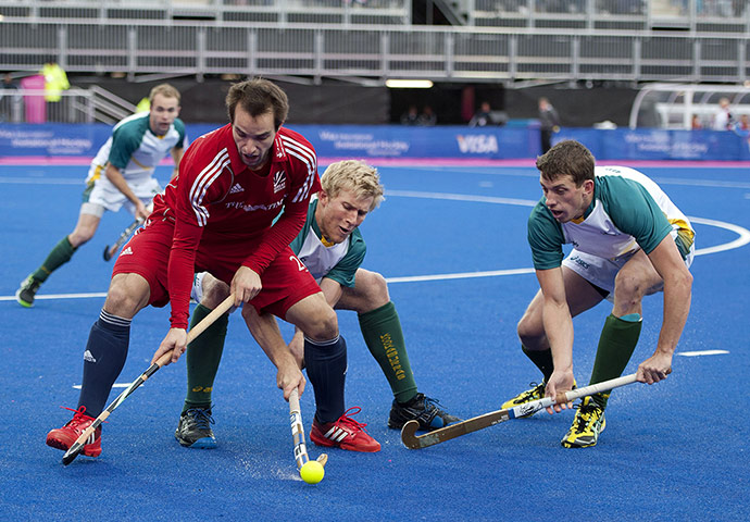 Olympics test event: Britain's Nick Catlin fights for the ball during the hockey test event