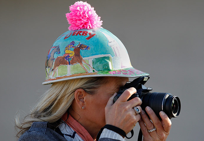 Kentucky Derby: Lisa Stemler of Louisville takes photos during morning workouts 