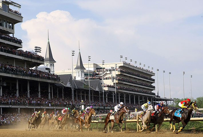Kentucky Derby: Dullahan ridden by Kent Desormeaux leads the field around the first turn