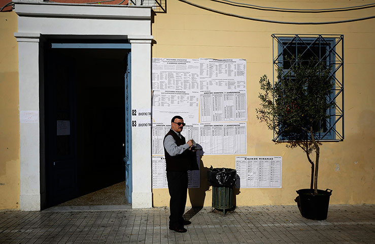 European elections: A man leaves a polling station after voting in Greece's national election