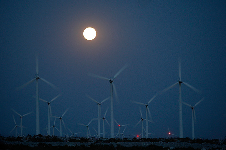 Supermoon: The supermoon rises behind wind turbines Palm Springs, California