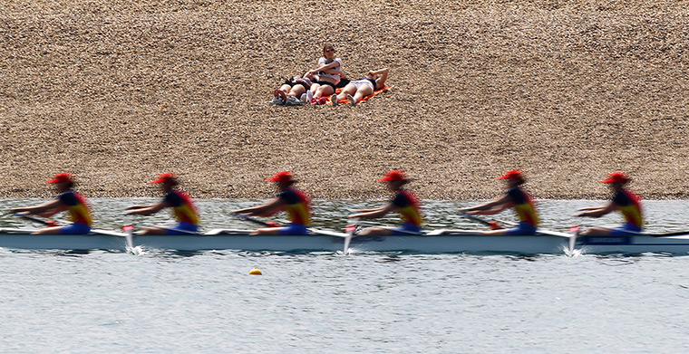 Supermoon: Competitors pass during World Rowing Cup on Ada Ciganlija lake