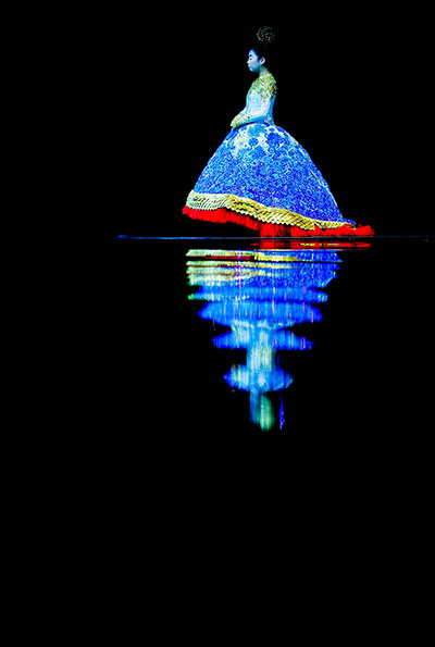 24 hours in pictures: A model displays a wedding gown by Guo Pei during Dragon Bride show