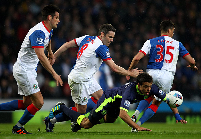 wigan v blackburn: Franco Di Santo is brought down by David Dunn