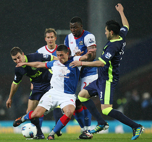 wigan v blackburn: Blackburn's Jason Lowe is crowded out
