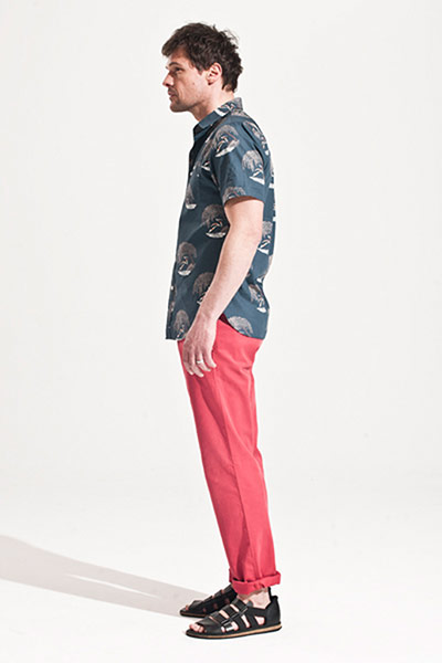 All Ages: Gavin wears blue patterened shirt and red trousers